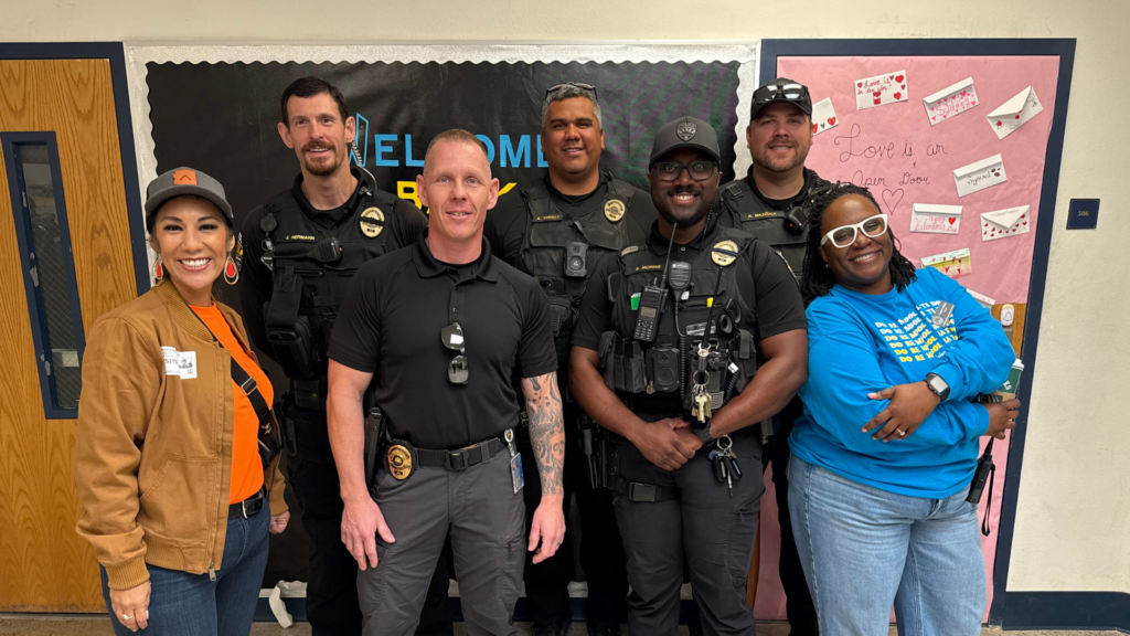 Group of community volunteers with Principal Cassie Hardge