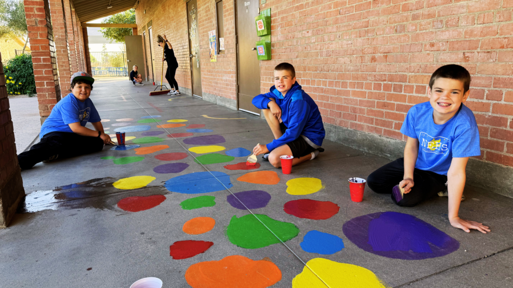 Students paint their school for Love Our Schools Day