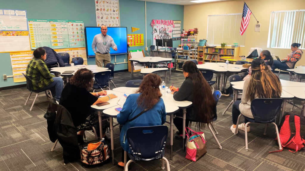 Community members participate in a Holbrook CAFE: a round table event designed to connect community support to strategic school and student needs.